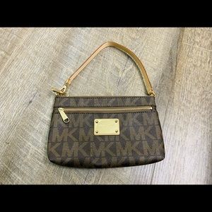 Micheal Kors big wristlet with monogram